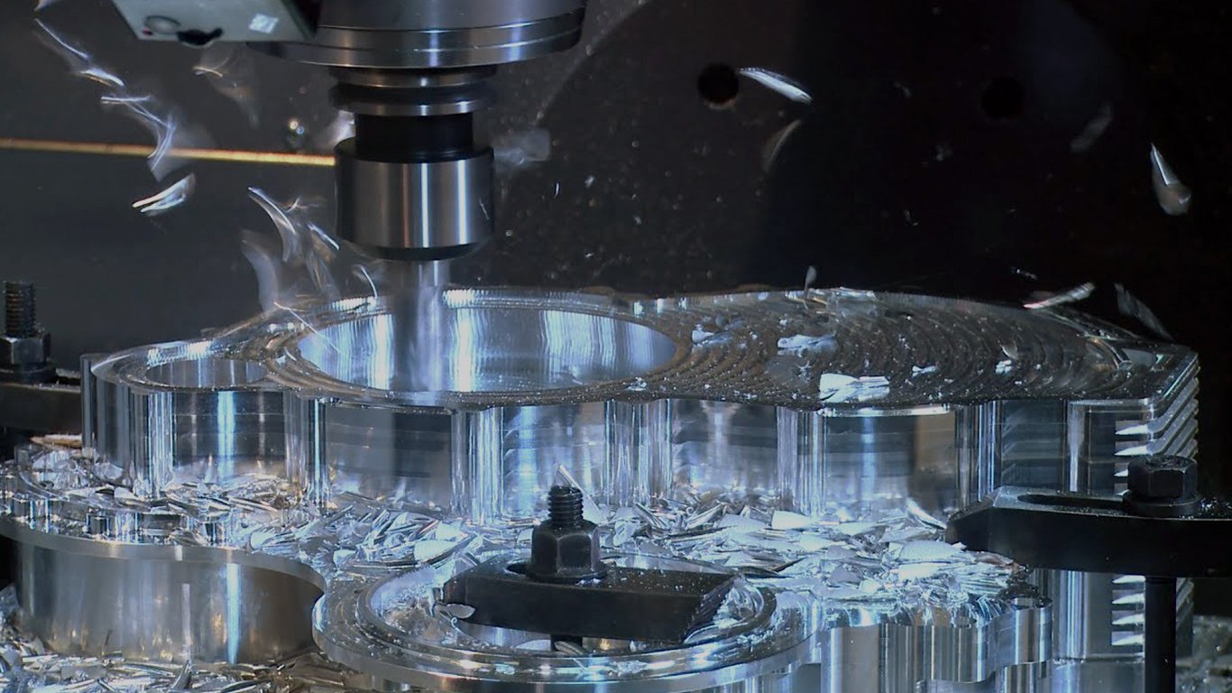 Hard machining with CBN tooling finishing a hardened steel part to final tolerance on a CNC machine