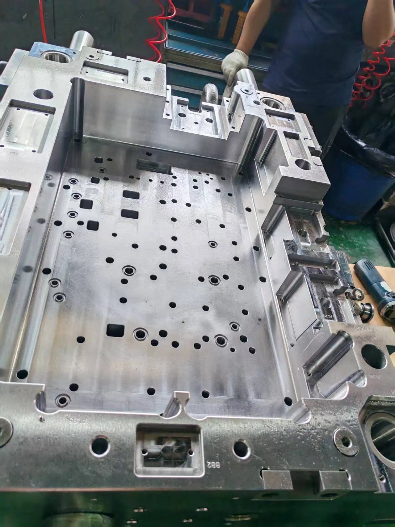 Sideplate Locks Under $100: 3 Essential Checks Before You Risk It 2 Mold base plates with machined pockets where sideplate locks under $100 are installed for interlock alignment