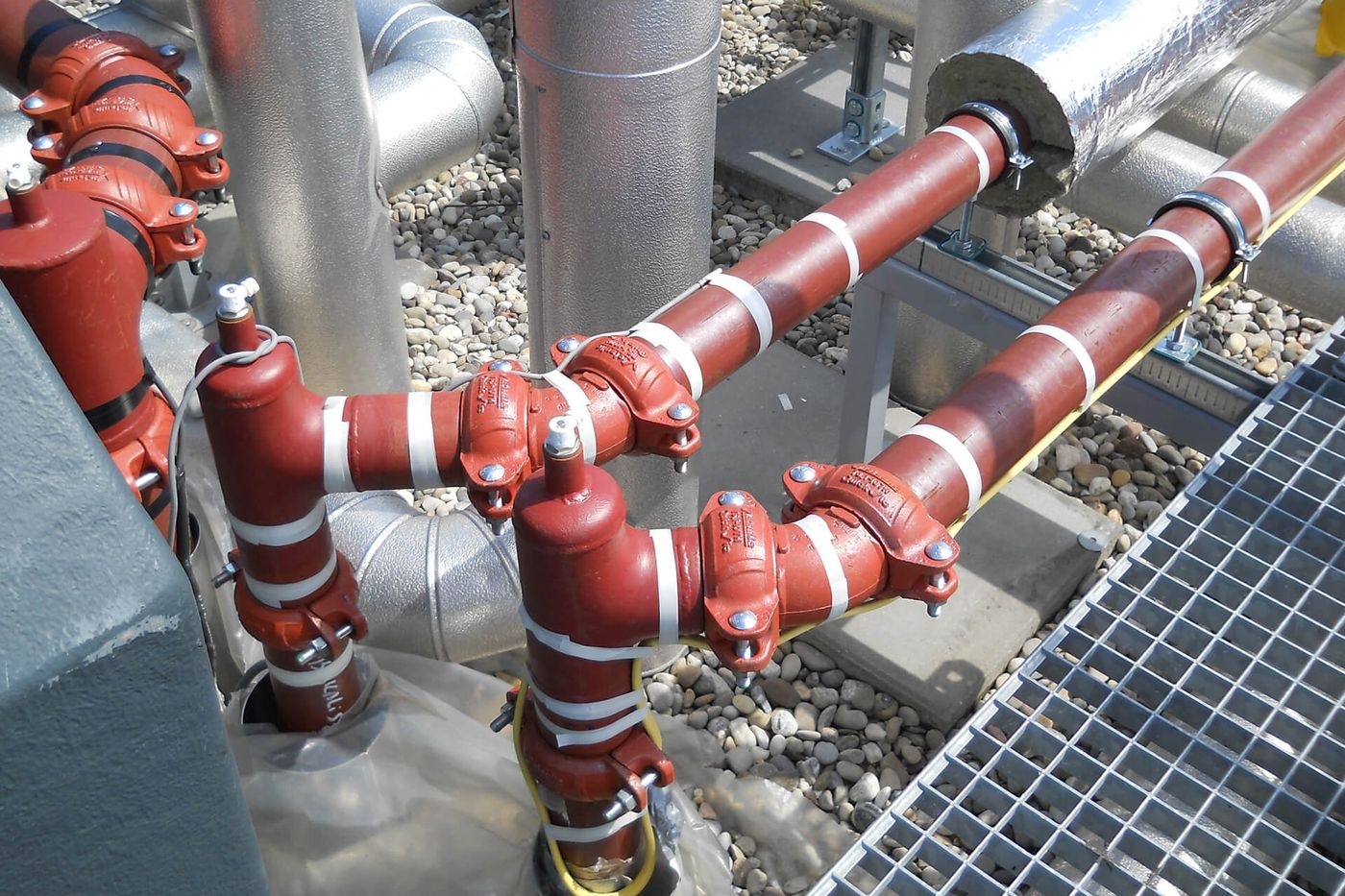 Insulated process pipe run wrapped with self regulating heat tracing in an industrial plant