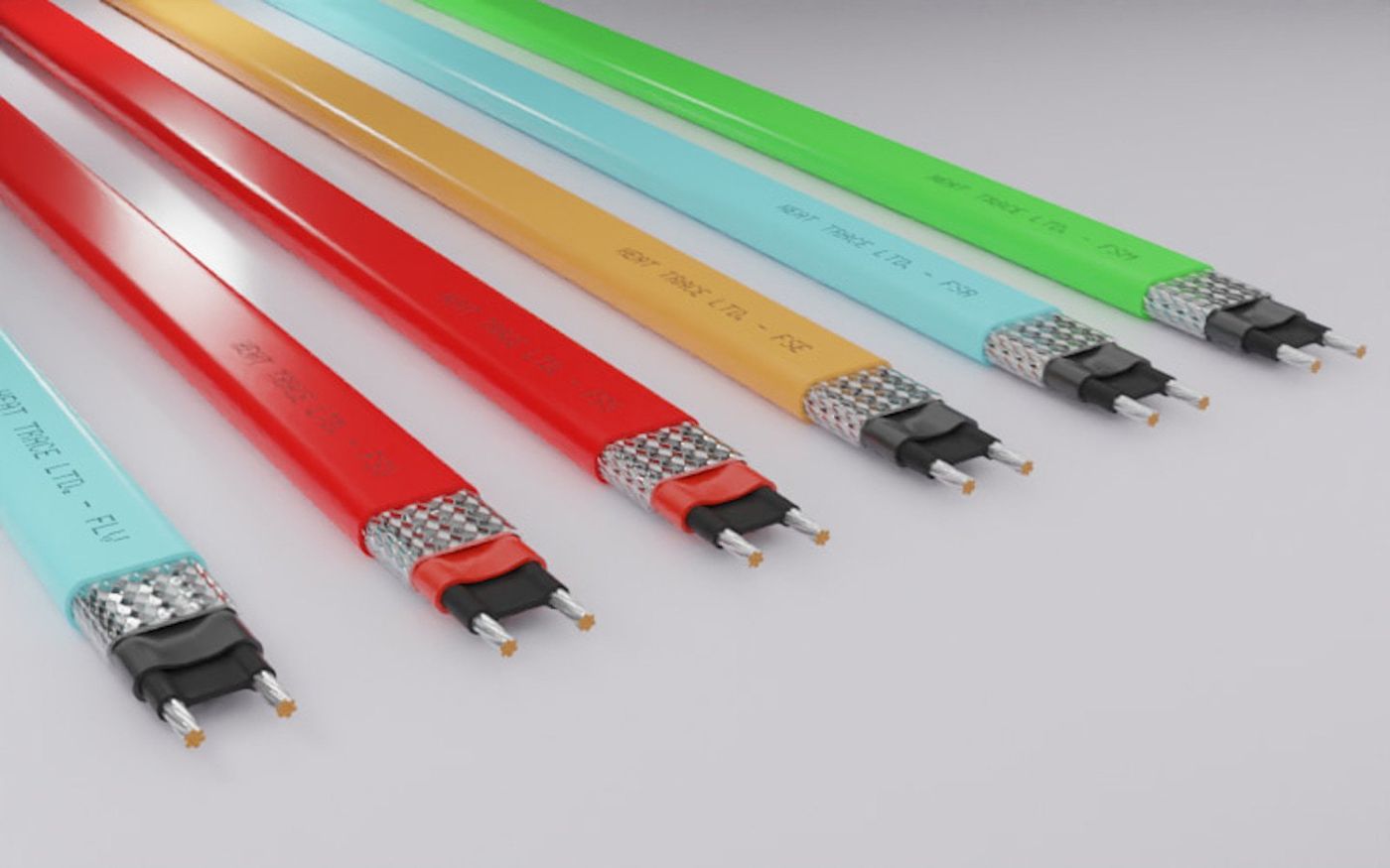 Self regulating heat tracing cable construction showing polymer core, bus wires, jacket and braid